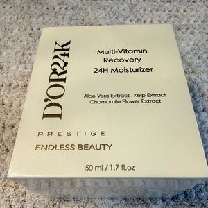 D'Or Skincare 24K Prestige Multi-Vitamin Moisturizer - Cream White & Gold Text